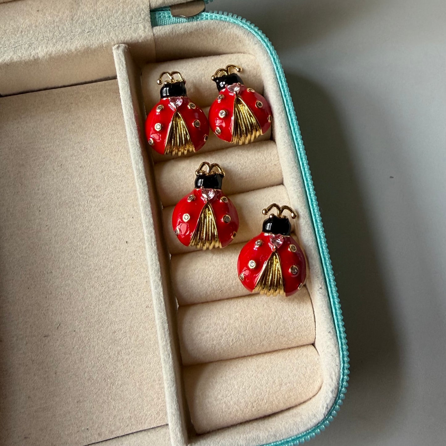 Red bug studs