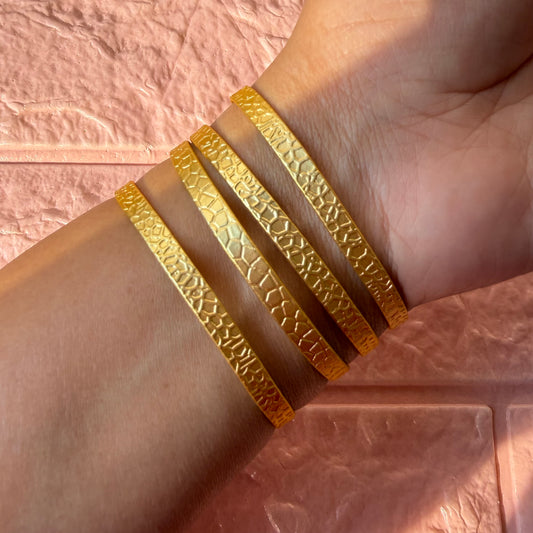 Set of 4 golden Cuffs