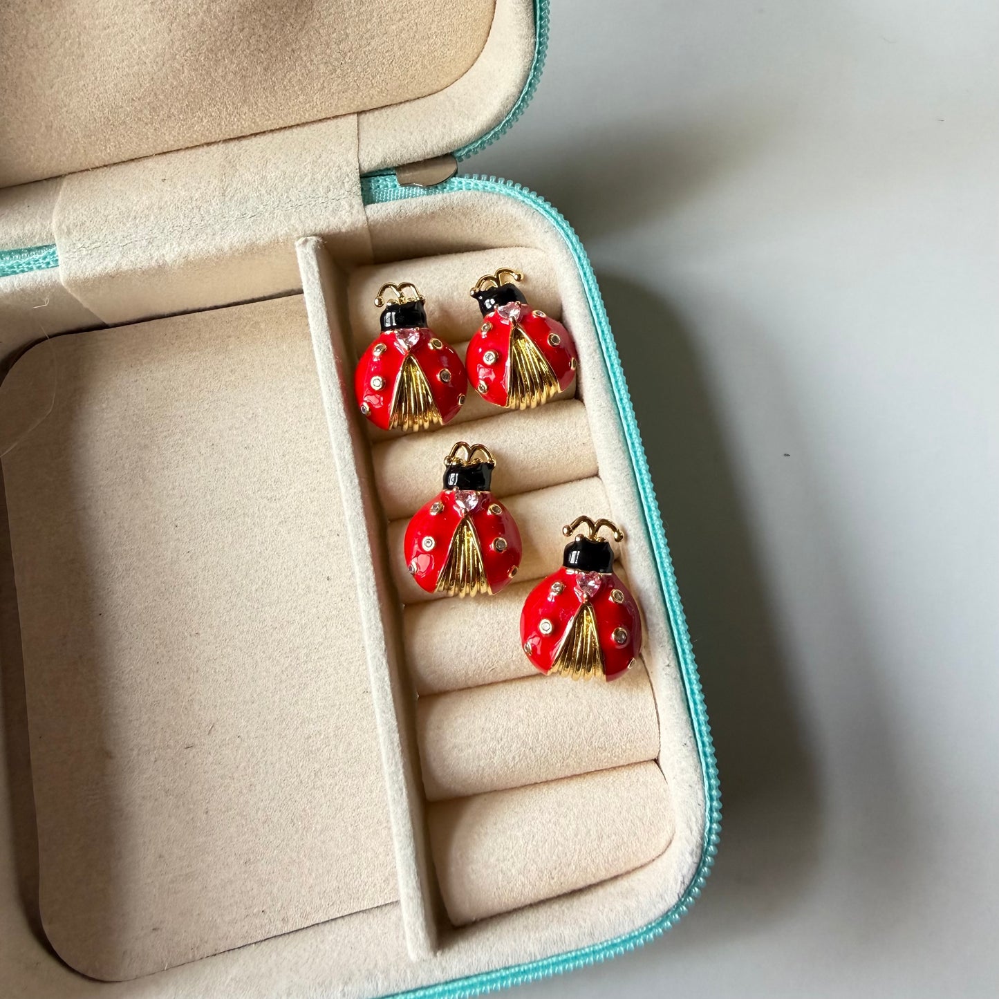 Red bug studs